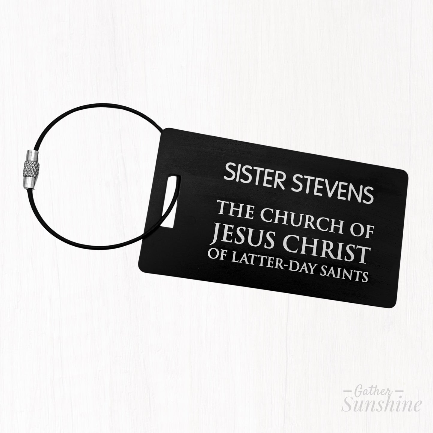 Black LDS-style missionary luggage tag in English. Size: 3.5x2 inch. A bold, colorful alternative by GatherSunshine.