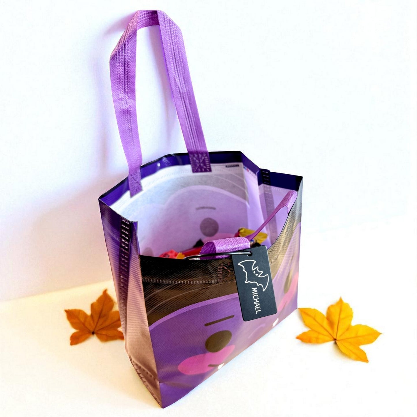 Free bat Halloween bag with candy with personalized tag purchase by Gather Sunshine.