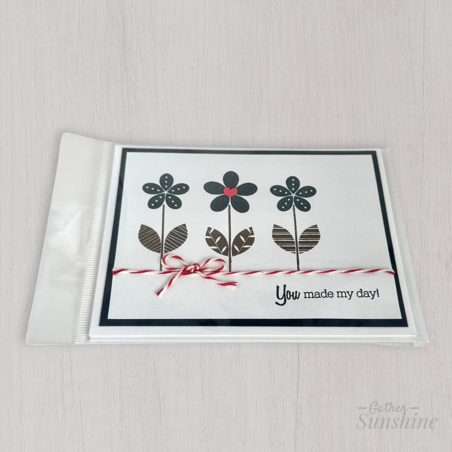 Handmade navy flower thank you card with red heart and “You made my day” phrase in sleeve, Gather Sunshine