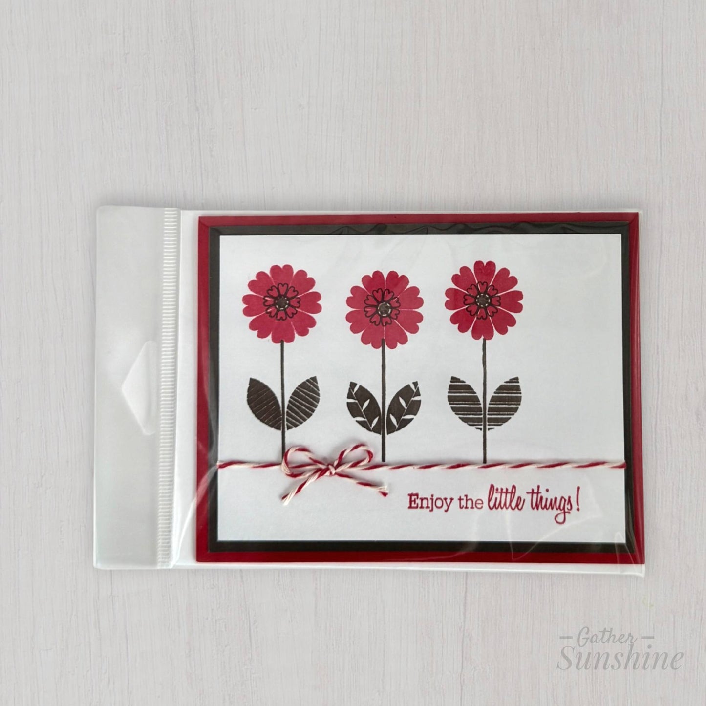 Hand-stamped red and black flower card in protective plastic sleeve with envelope, handmade by Gather Sunshine