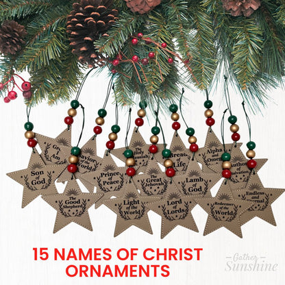 Star-shaped Christmas ornaments with names of Christ on a tree with pine cones and berries by Gather Sunshine.