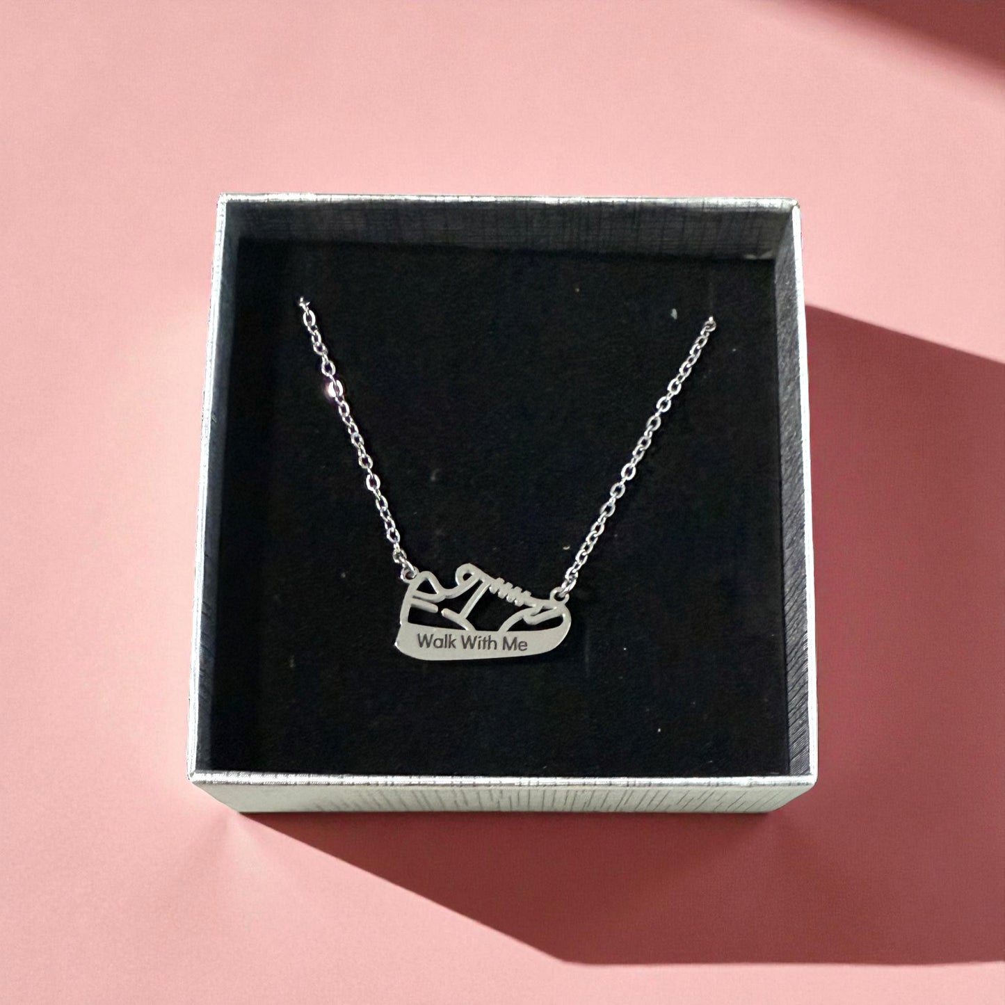 Silver “Walk With Me” necklace in gift box on soft pink background - LDS youth theme jewelry gift by Gather Sunshine.